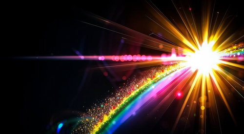黒背景に放射する虹色の光芒