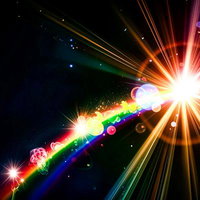 宇宙に広がる虹色の光芒の写真