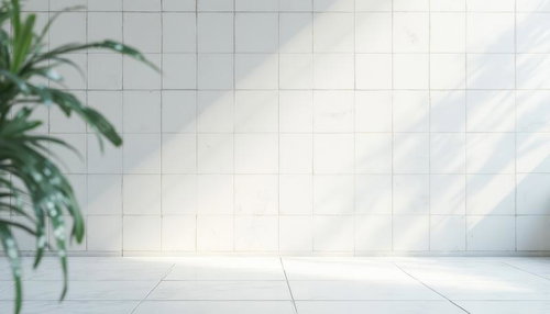 観葉植物と白いタイル壁の明るい空間