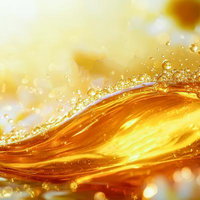 きらめく水滴が躍る滑らかに波打つ黄金色の蜂蜜のAI画像
