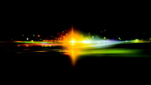 闇に浮かぶカラフルな光のスペクトルと虹色の輝き