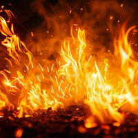 力強く燃え上がる火炎の躍動と炎上する黒背景の炎のダイナミクスの写真