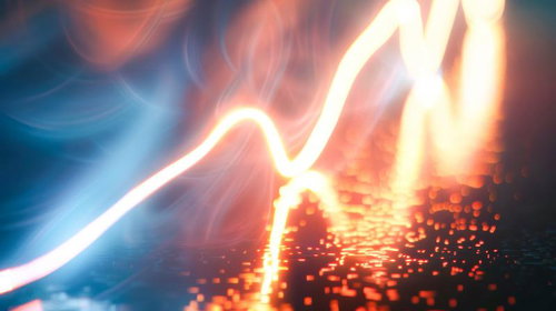 駆け抜ける光の波と炎の粒子が交差する近未来的なエネルギー表現