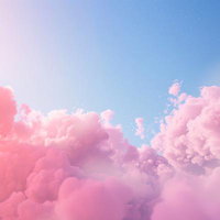 朝焼けに染まるピンク色の雲と穏やかな青空の写真