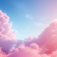 ピンクと紫に染まる雲と青空のコントラストの写真