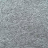 灰色の綿麻混紡布生地のテクスチャーの写真