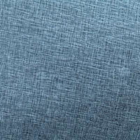 自然な陰影が浮かぶグレーベースの布地の写真