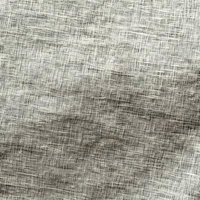格子状の織り目が均一に並ぶリネン生地のテクスチャーの写真