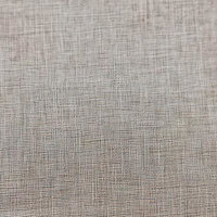 グレー系の点描画のような細かな織り模様のテクスチャーの写真