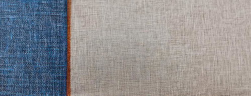 グレー系の点描画のような細かな織り模様のテクスチャー