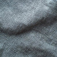 麻織物の繊維と織り目をクローズアップした質感の写真