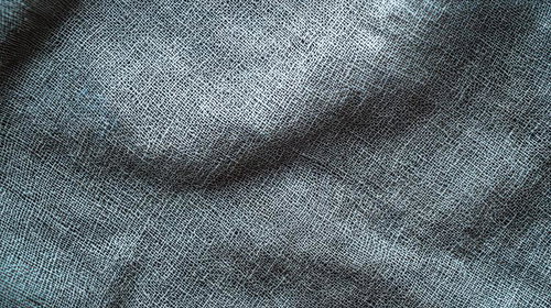 麻織物の繊維と織り目をクローズアップした質感