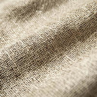 ベージュ色の麻布テクスチャの写真