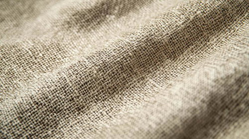 ベージュ色の麻布テクスチャ