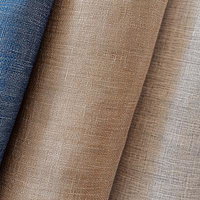 4色の布地を重ねて並べたテキスタイル見本の写真