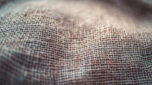 麻布の質感を捉えた接写、織り目の細かい規則正しい配置