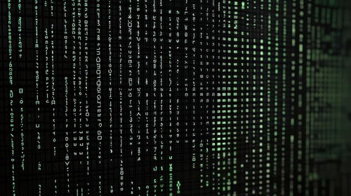 緑色の文字コードが縦に流れるマトリックス風デジタル背景