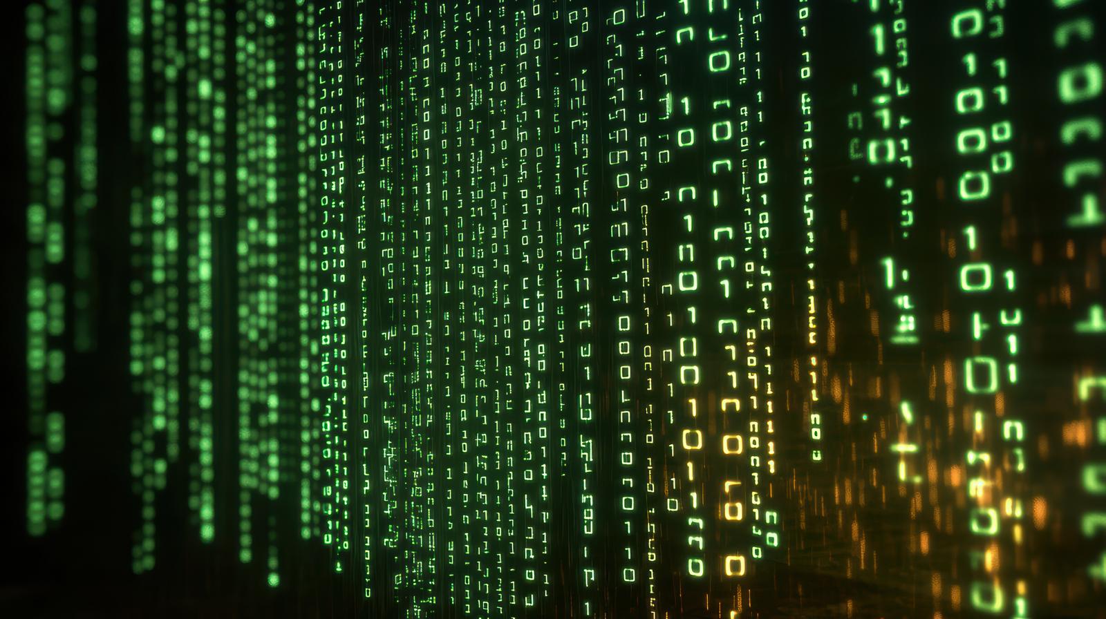 Dark screen with green and orange binary code flowing vertically