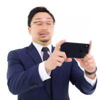 現実逃避するアプリエンジニアの写真