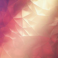 紫からオレンジへグラデーションする光の多面体デザインの写真