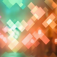 カラフルな四角形のモザイク光が浮かぶグラデーションデザインの写真