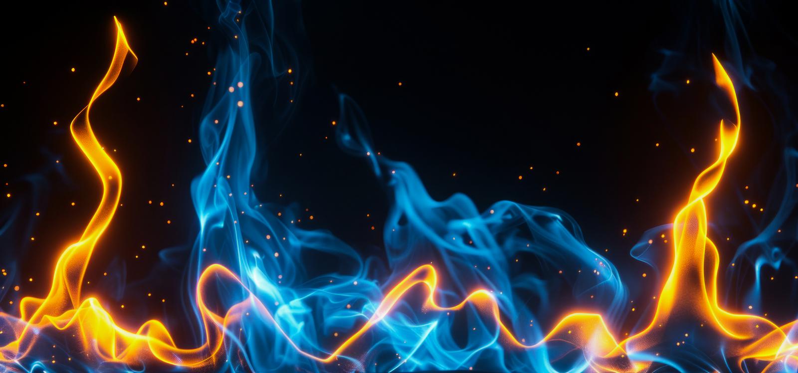 青白と黄金色に輝く炎が立ち上り、周囲に光の粒が散る様子