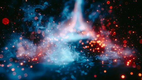 暗闇で弾ける光の粒子が躍動する共演～青とオレンジの発光エネルギー
