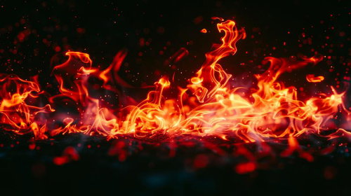 黒い背景に力強く燃え広がる火炎のCGエフェクト