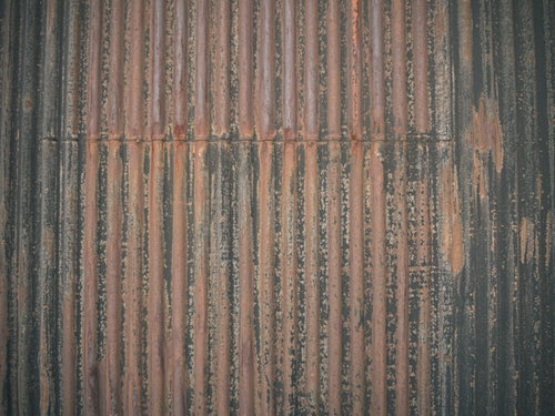 錆びついたトタン波板のテクスチャー