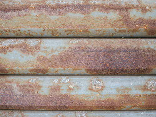 錆て腐食するシャッターの金属表面テクスチャー