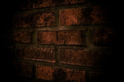 不気味な煉瓦積みの古い外壁テクスチャー写真