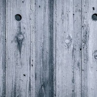 白く風化した木板のテクスチャーの写真