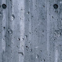 傷と凹凸が目立つ木目の壁テクスチャーの写真