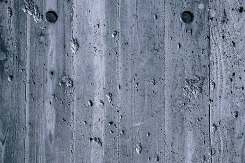 傷と凹凸が目立つ木目の壁テクスチャー