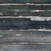 傷ついた黒い板の木目テクスチャー風化した古材の写真