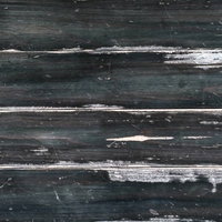 グレーと黒に白い筋が走る古い木の板のテクスチャー背景の写真