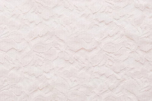 花と葉の模様が浮き出た白いレースのテクスチャー