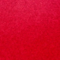 わずかな凹凸がある赤い布地の表面のテクスチャーの写真