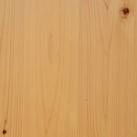 木の年輪と表面の筋が見える木目のテクスチャの写真