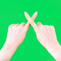 ✕と表現する両手のジェスチャー（グリーンバック）の写真