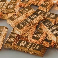 小さいゴールドバーが積み重なるの写真