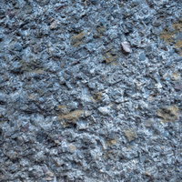 土や砂が付着したコンクリート壁のテクスチャの写真