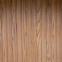 光と影が作る木目調の板壁テクスチャの写真