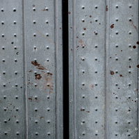 塗料が付いた足場板のテクスチャーの写真