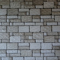 不規則に歪んだタイル壁のテクスチャーの写真