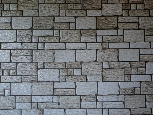 不規則に歪んだタイル壁のテクスチャー