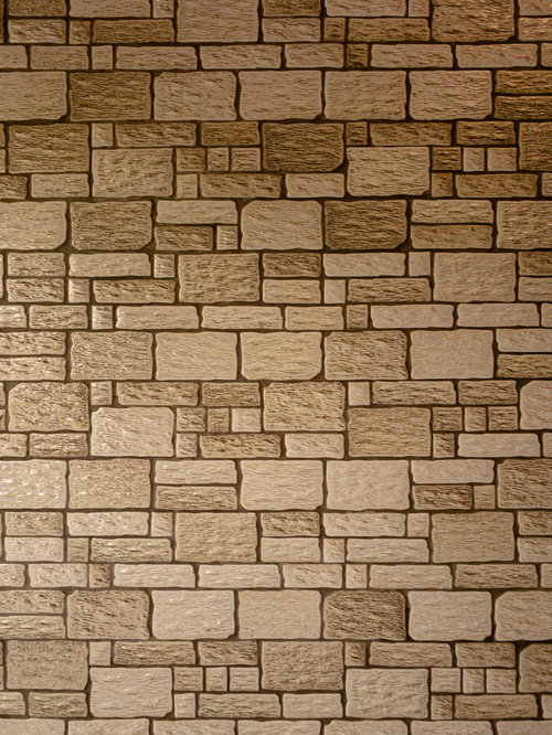 不規則な形が並ぶタイル壁のテクスチャー