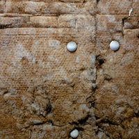 ボロボロに劣化した保温材のテクスチャの写真