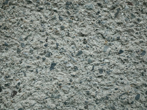 砂利が詰まったコンクリートのテクスチャー