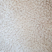 モコモコの裏生地のテクスチャー｜白色ふわふわ繊維の写真